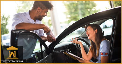 Woman in car talking to man
