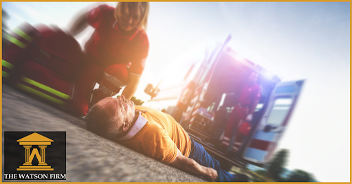 EMT treating man on road