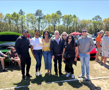 Aaron Watson with a group of people