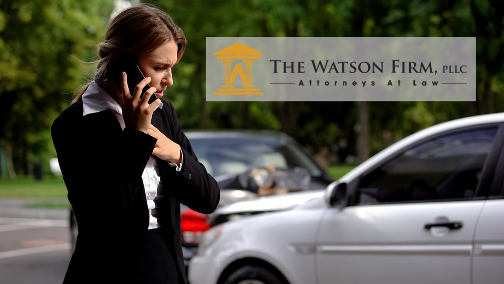 Woman on the phone with the police after a car accident